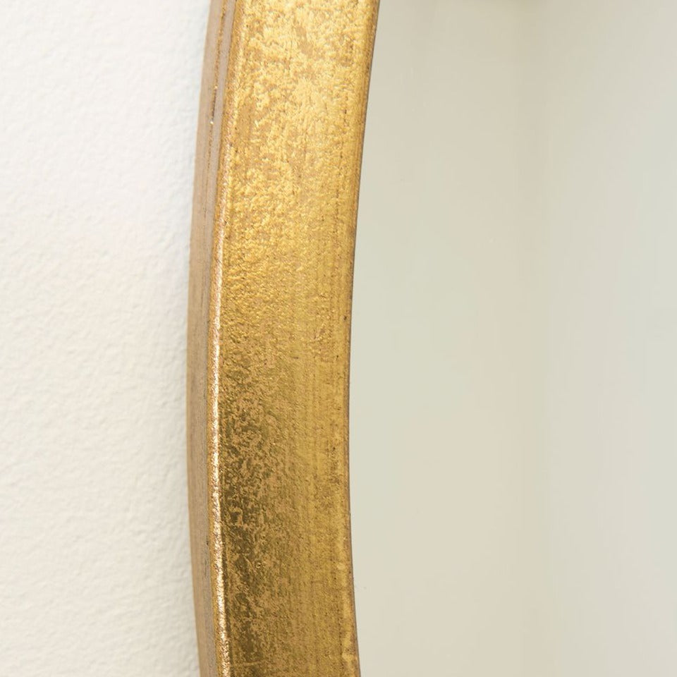 Gold round mirror