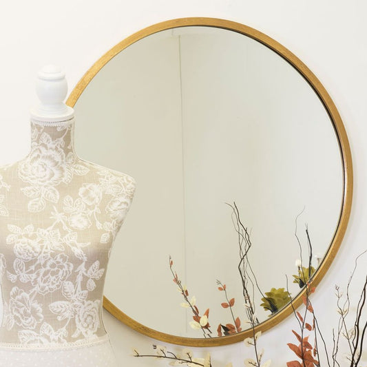 Gold round mirror